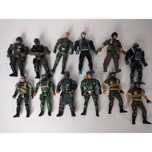12 Military And Assortment Of Action Figures.